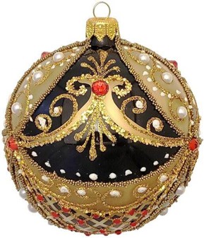 Guld/sort juletræskugle dekoreret med hvide perler og røde krystaller
