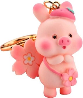 Nøglering med en sjov, pink gris. Sjove, bedste og børnevenlige