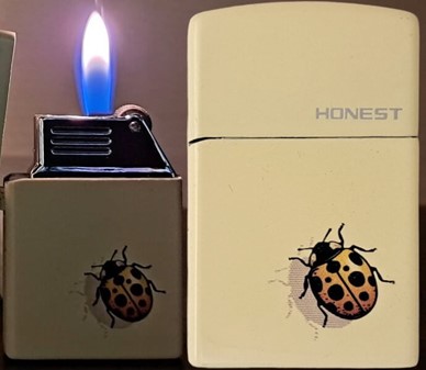 Din pålidelige metal gaslighter med en lykkelig mariehøne!