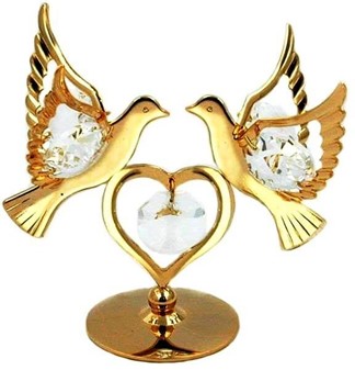 Et guldbelagt hjerte og to duer dekoreret med Swarovski-krystaller