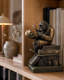 Den Oplyste Abe. Dekorativ figur med hemmelig æske og symbolik