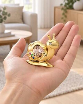 Forgyldt snegl med Swarovski-krystaller. En lille, men unik gave