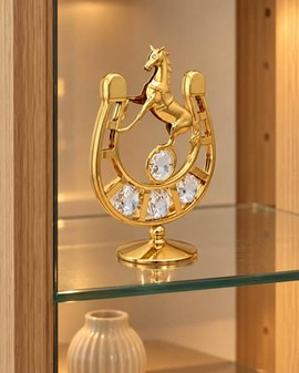 Forgyldt hestesko med Swarovski-krystaller. For heldigvis