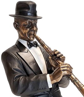 GAVE TIL MUSIKER. Flot bronzefigur af Jazz klarinettist. Reol pynt