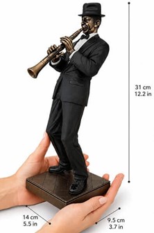 GAVE TIL MUSIKER. Flot bronzefigur af Jazz klarinettist. Reol pynt