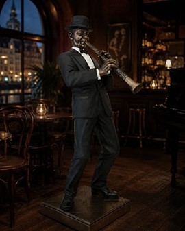 GAVE TIL MUSIKER. Flot bronzefigur af Jazz klarinettist. Reol pynt