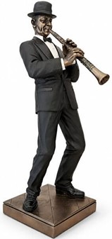 GAVE TIL MUSIKER. Flot bronzefigur af Jazz klarinettist. Reol pynt