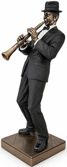 GAVE TIL MUSIKER. Flot bronzefigur af Jazz klarinettist. Reol pynt