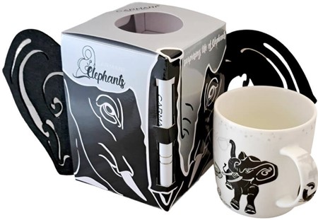 Smukt hvidt porcelænskrus med sorte elefanter. Dejlig gave til et barn