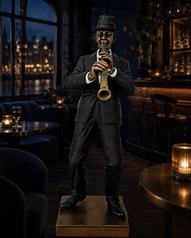 GAVE TIL MUSIKER. Flot bronzefigur af Jazz klarinettist. Reol pynt