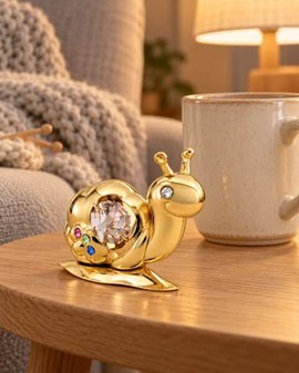 Forgyldt snegl med Swarovski-krystaller. En lille, men unik gave