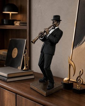 GAVE TIL MUSIKER. Flot bronzefigur af Jazz klarinettist. Reol pynt
