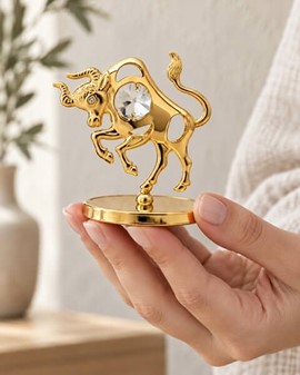 STJERNETEGN FIGUR TYR. Forgyldt og indlagt Swarovski Krystaller