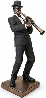 GAVE TIL MUSIKER. Flot bronzefigur af Jazz klarinettist. Reol pynt